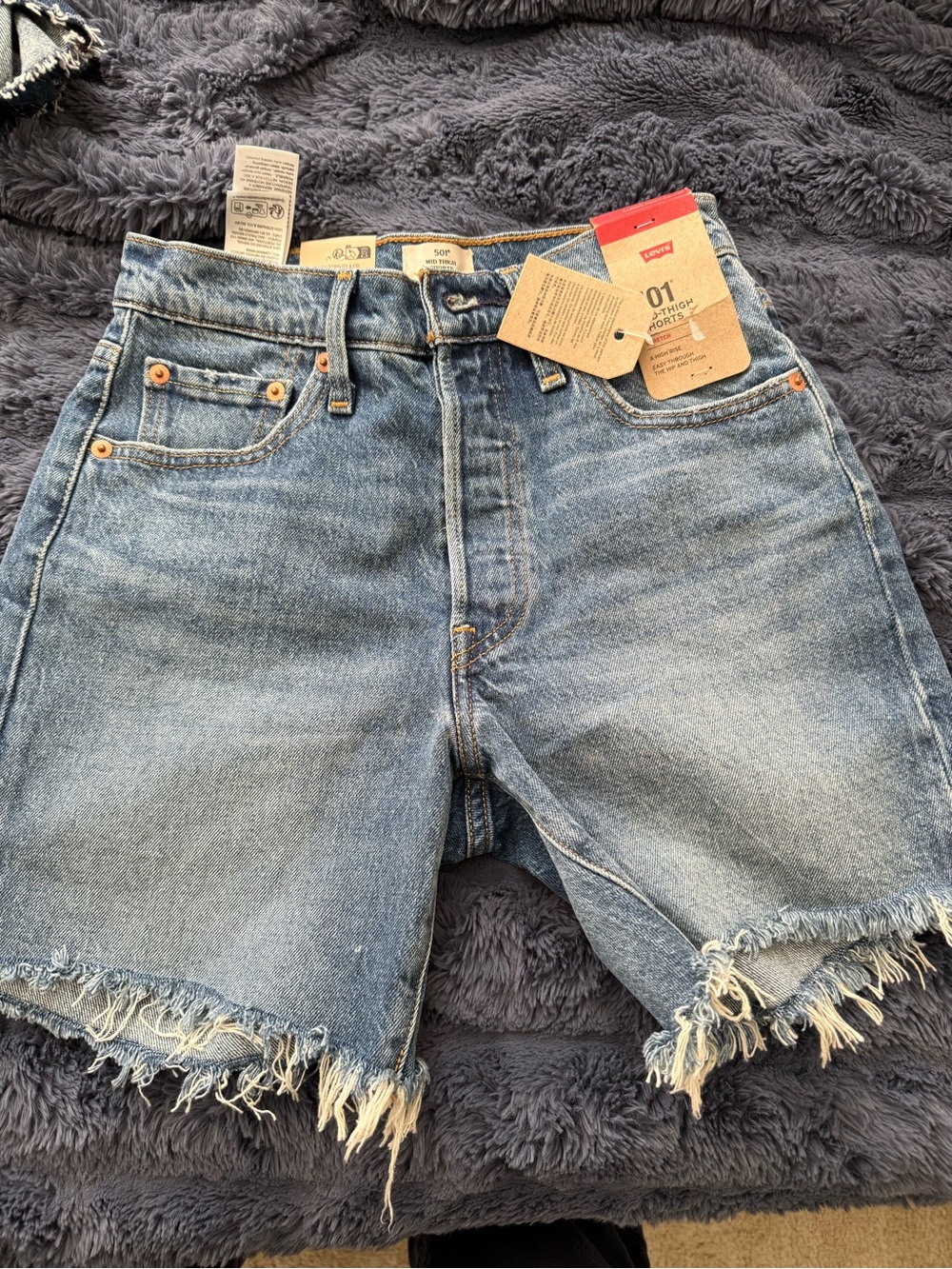 Levi's Light Blue Distressed High-Rise Jean Shorts